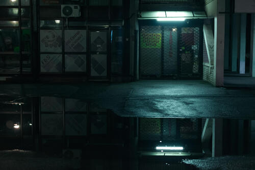 Neon lit puddle